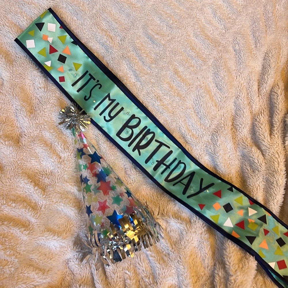 Flashing “It’s my birthday” sash and hat!